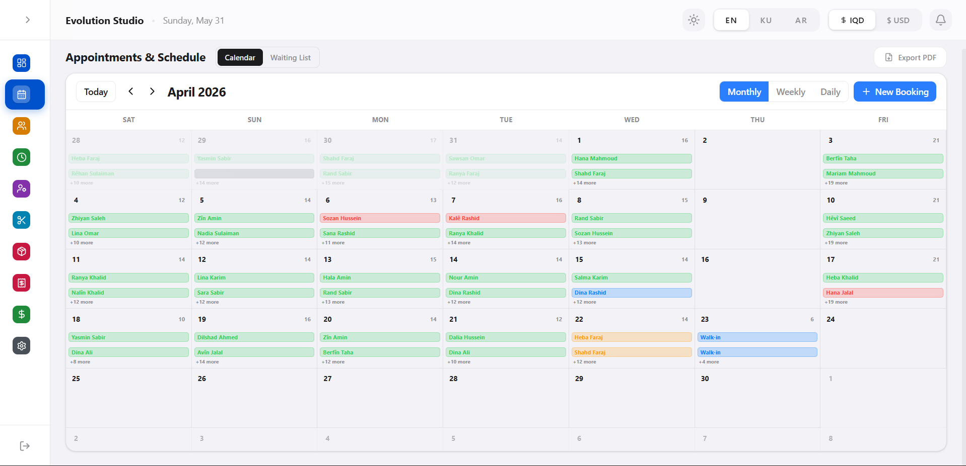 krd.beauty admin panel — Appointments & Schedule monthly booking calendar with color-coded multi-staff appointments, EN/KU/AR and IQD/USD